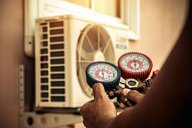 Professional Heat Pump Repair technician working in Buena Vista, MI